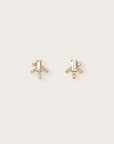Gold earrings with baguette-cut center stones and radiating diamond-studded bars
