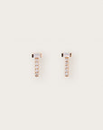 A pair of rose gold stud earrings with vertical pavé diamond bars, topped with horizontally set baguette-cut gemstones in a modern T-shaped silhouette.