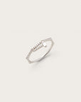 White gold ring with pavé diamonds and a baguette-cut accent