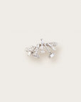 White gold ring with an abstract design featuring baguette and round-cut diamonds arranged in a dynamic, fan-like pattern
