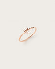 Rose gold ring with baguette and pear-cut diamonds